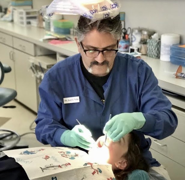 Joel Julio Vela, DDS — pediatric dentist in Bellaire